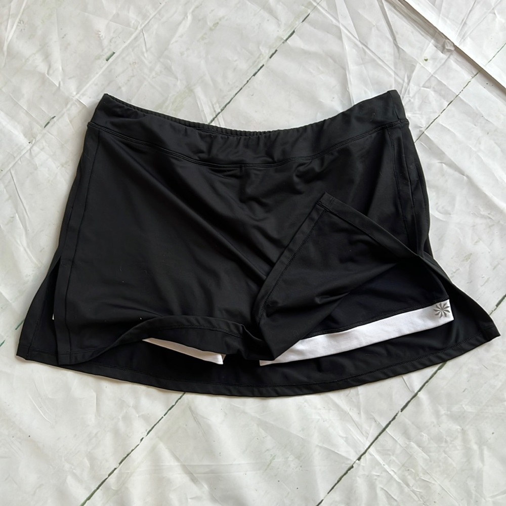 Athletic skort with lightly padded bike shorts built in.